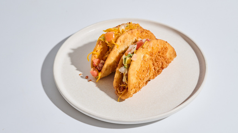 Two chicken bacon ranch Street Chalupas on a plate.