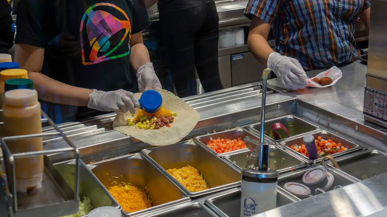 Taco Bell Cantina employees preparing food