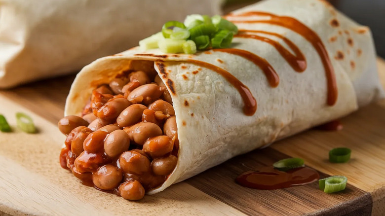 a classic Mexican dish featuring beans with burrito and tortilla