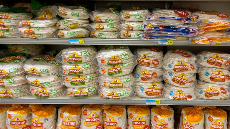 Mission tortillas stacked on a store shelf