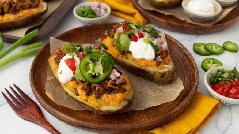 Side shot of taco-themed twice baked potatoes