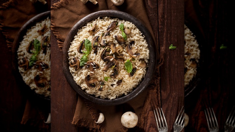Mushrooms and herbs over rice