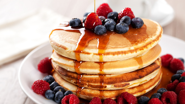 Pancakes with syrup and berries