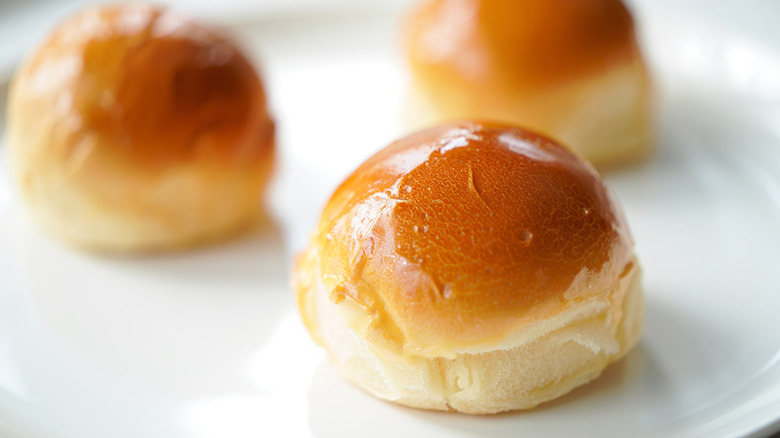 Brioche bun on white background