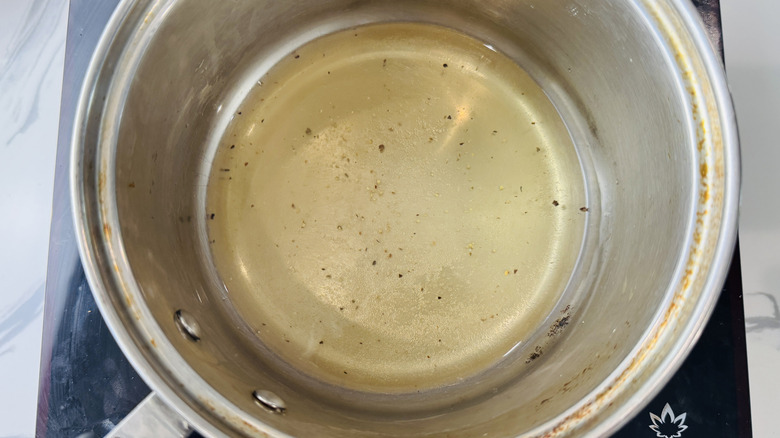 Aerial view of pickle brine in saucepan