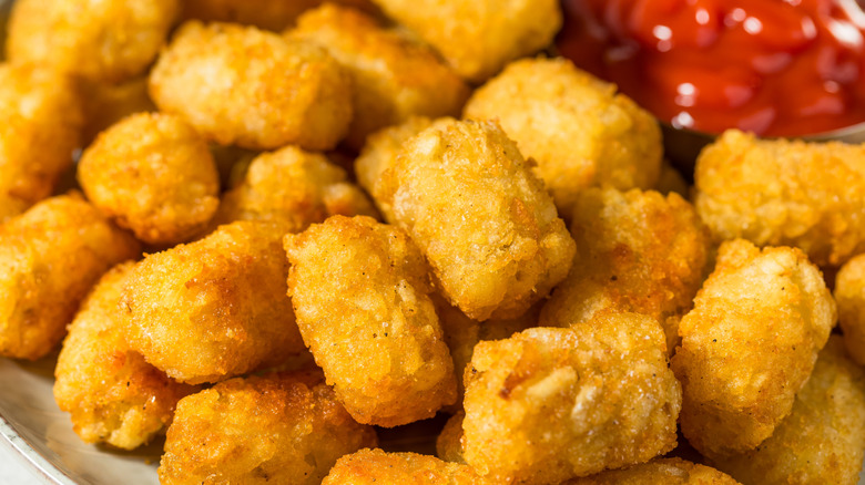 Pile of tater tots and ketchup