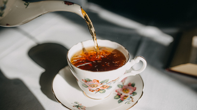 black tea poured into cup