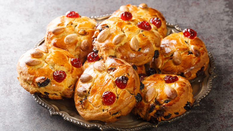 A stack of fat rascals sitting on a plate.