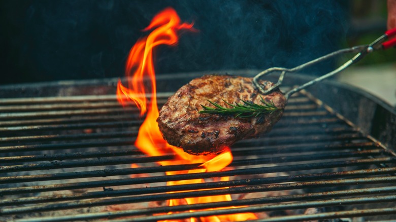 steak being seared over direct heat
