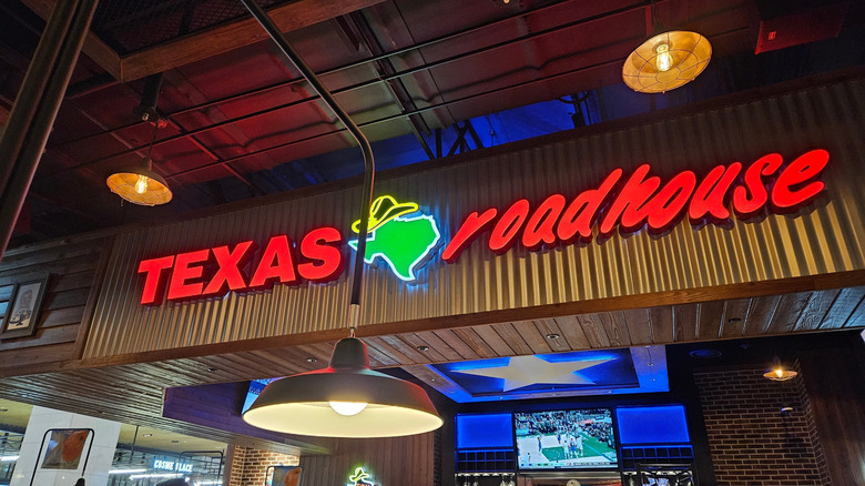 Texas Roadhouse sign inside night