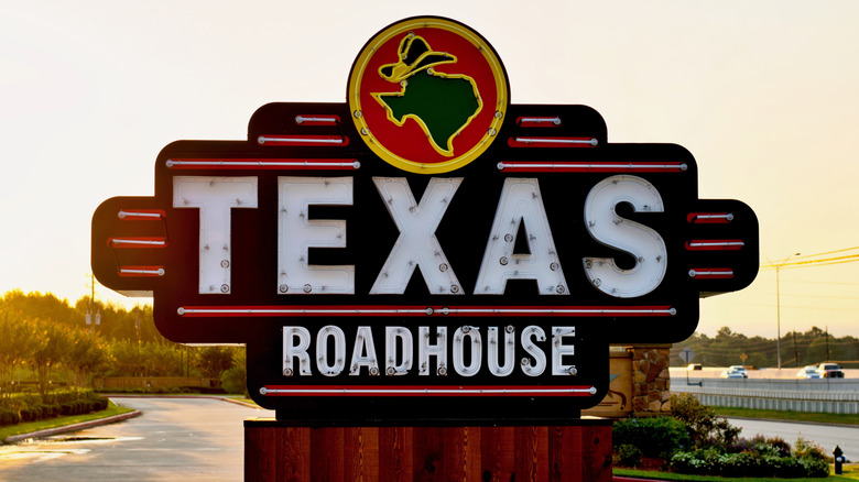 Texas Roadhouse restaurant sign on a freeway in Humble, Texas.