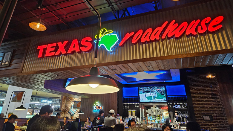 Texas Roadhouse interior with neon signage