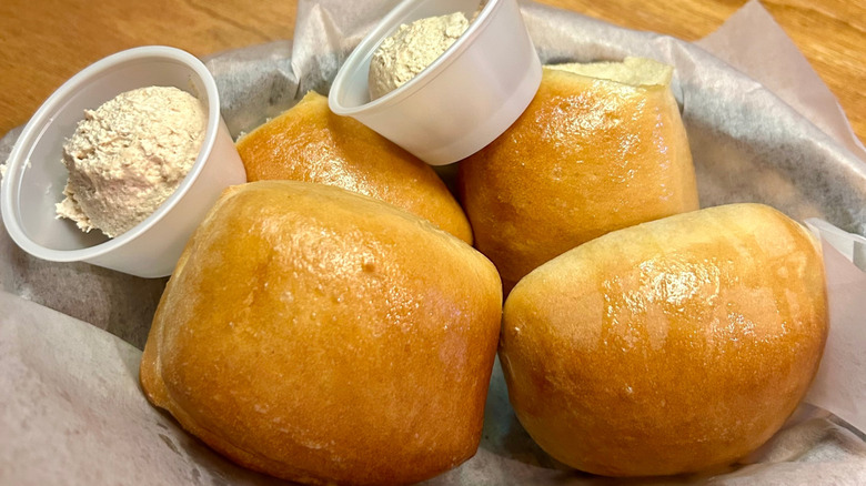 A basket of Texas Roadhouse bread and butter.