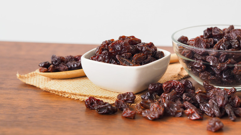 Raisins in bowls and spoon