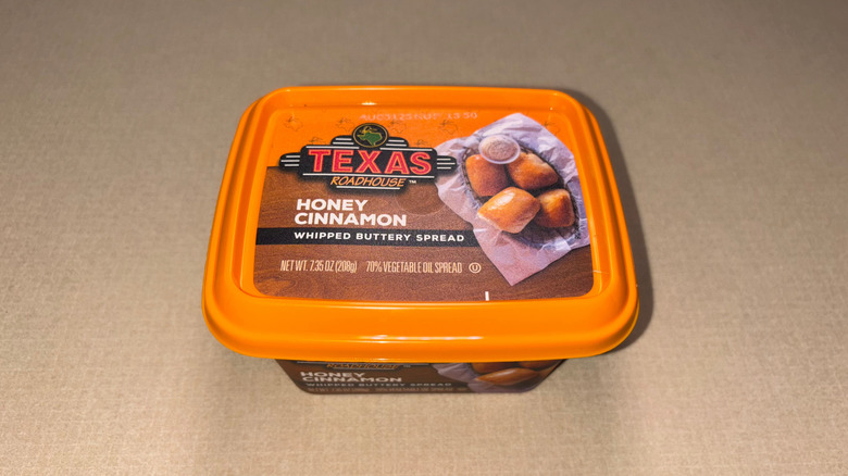 Texas Roadhouse honey cinnamon spread in orange container