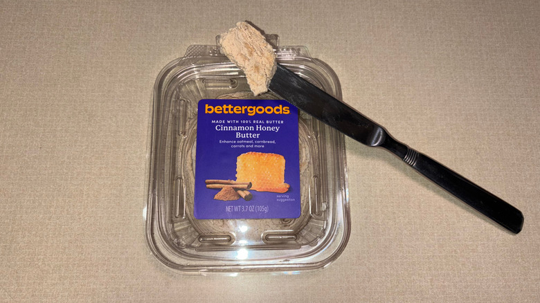 Bettergoods cinnamon honey butter with a knife with butter resting on it