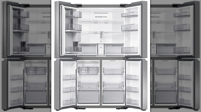 Open Samsung 23 cu. ft. counter depth 4-door French door refrigerator on a white background