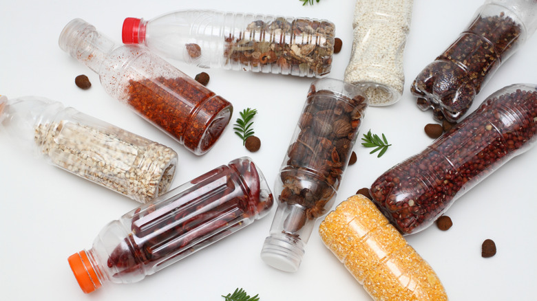 Recycled plastic water bottles filled with dried goods