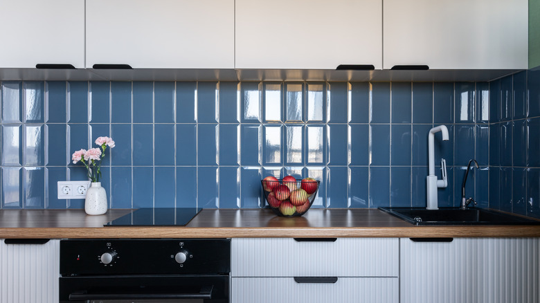 Bright blue tile backsplash