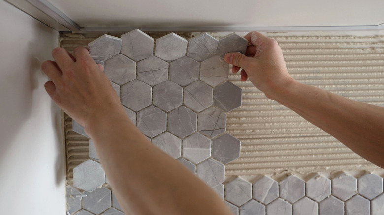 Mosaic tile backsplash installation