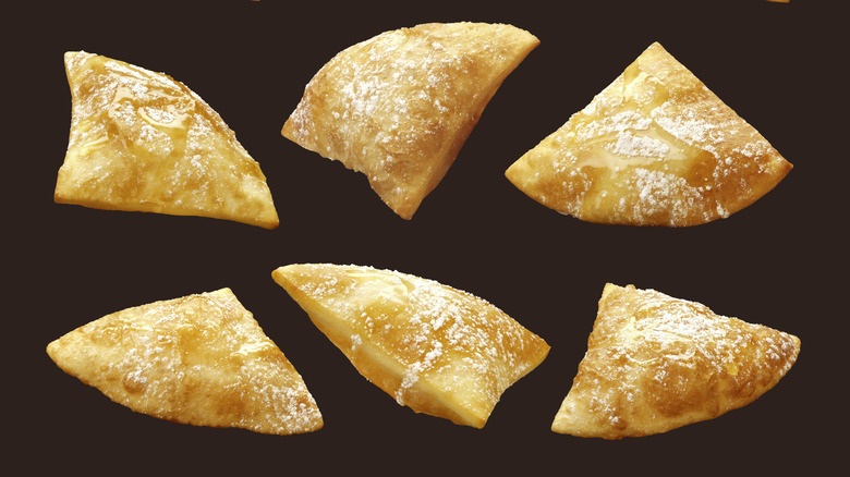 Six sopapillas, grid layout, with black background