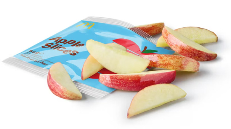 An open packet of McDonalds apple slices.