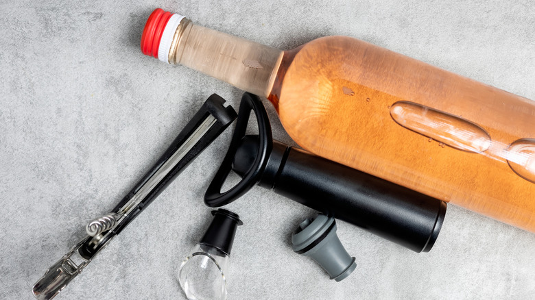 Wine bottle with accessories and wine bottle stopper