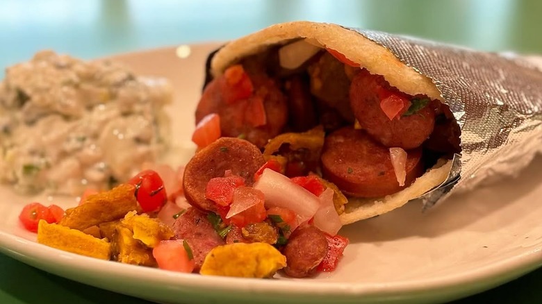 A chorizo-filled arepa from Maiz Colombian Street Food