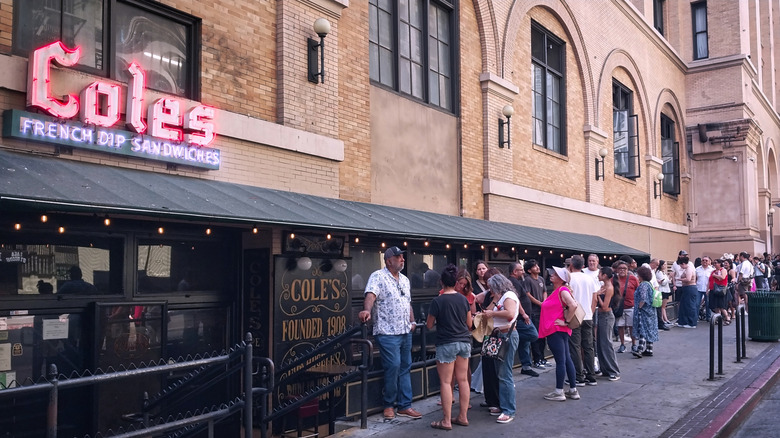 Customers line up outside Cole's French Dip in Los Angeles.