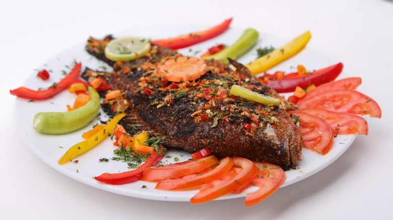 roasted halibut with sliced tomatoes