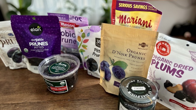 assortment of prune packages on a table