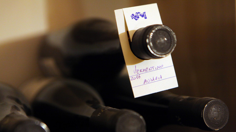Bottle with a hangtag that reads "Vermentino 2016 Austria"