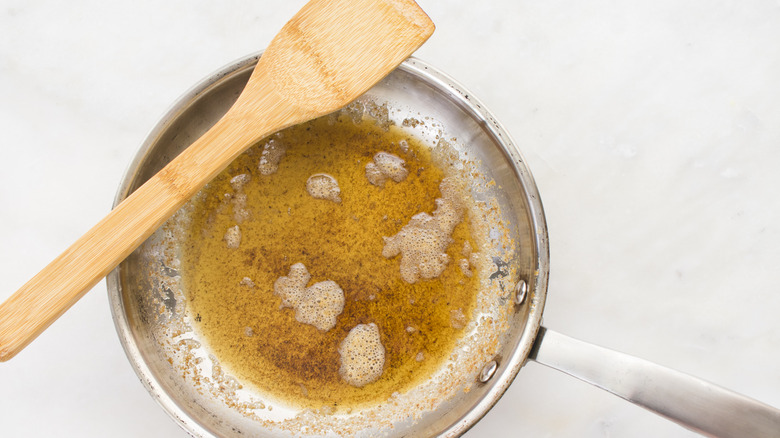 melted butter in skillet