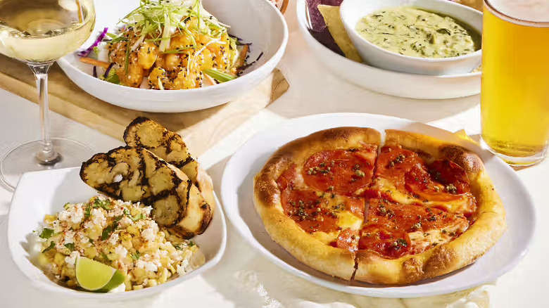 Promotion for CPK Happy Hour with four dishes and drinks on white background