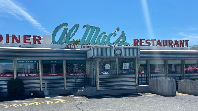 Exterior of Al Mac's Diner with a steel storefront and large sign
