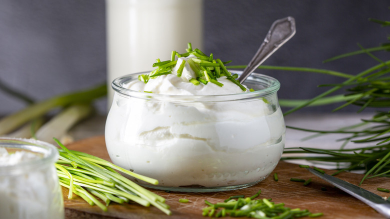 Sour cream in glass jar