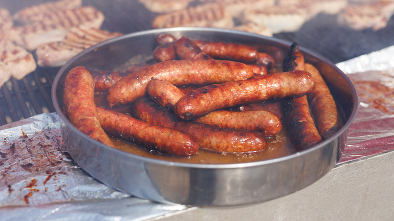 pile of hot dogs in a pan