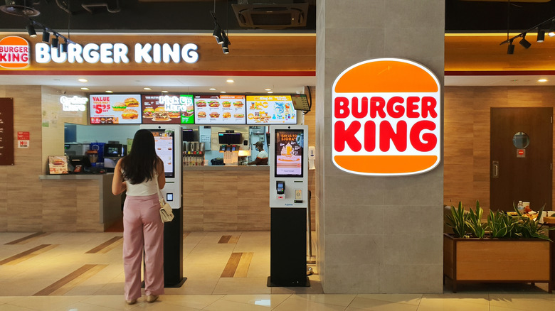 girl ordering at burger king