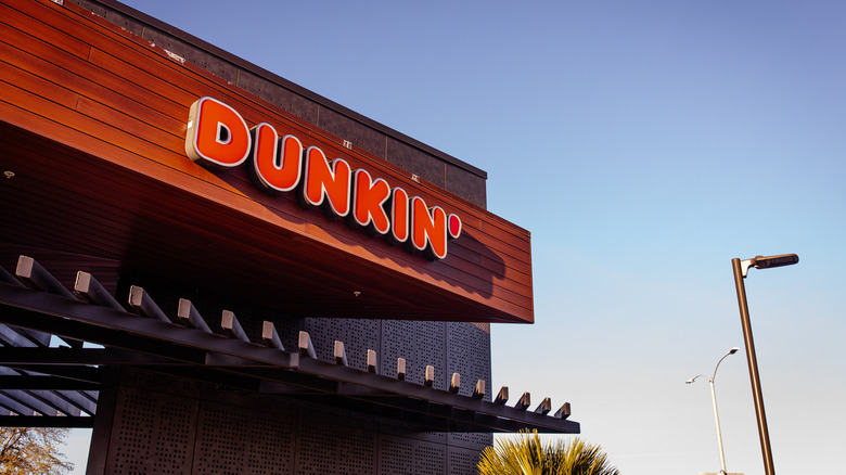 dunkin' sign on side of store