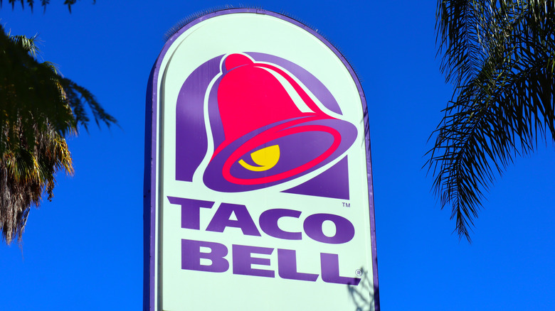 taco bell sign and trees