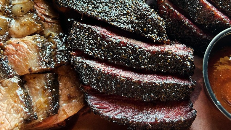 Beef cheeks with rich bark, purple rings, and visible moisture