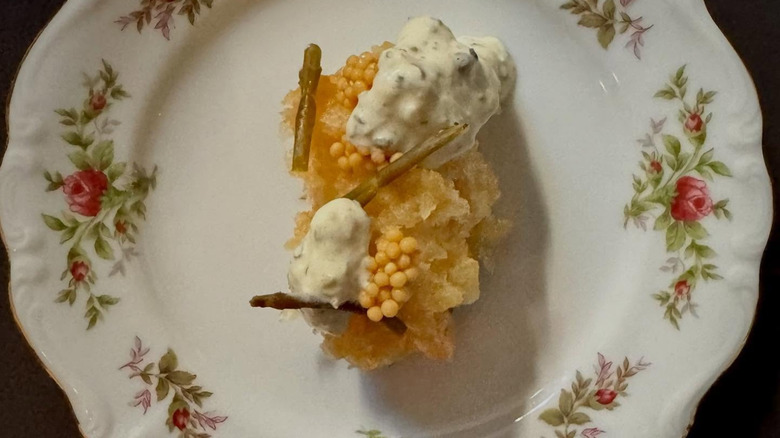 A reimagined fish & chips on an antique style plate