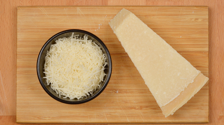 Grated Parmesan with a bowl of cheese