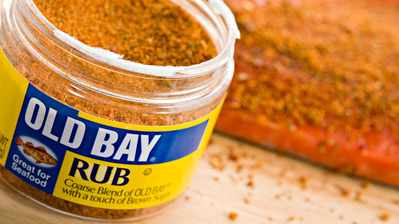 Old Bay seasoning on wooden surface
