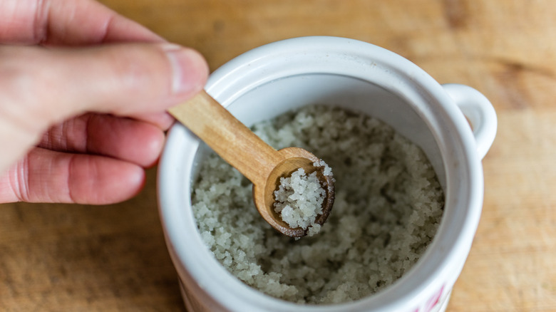 Seasoned salt in small dish with a spoon