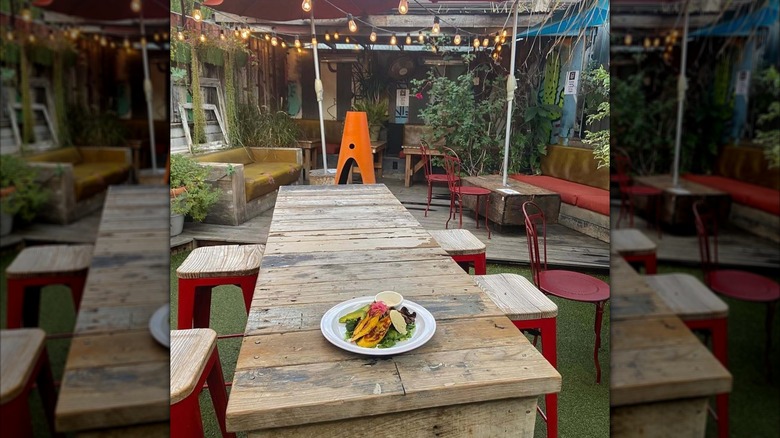 Back garden seating area at Cafecito Organico Silver Lake