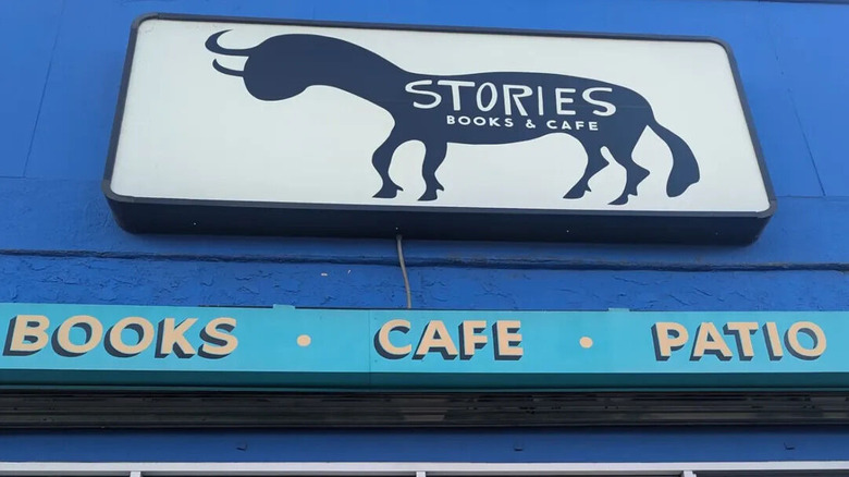 The blue street sign for Stories Books & Cafe in LA