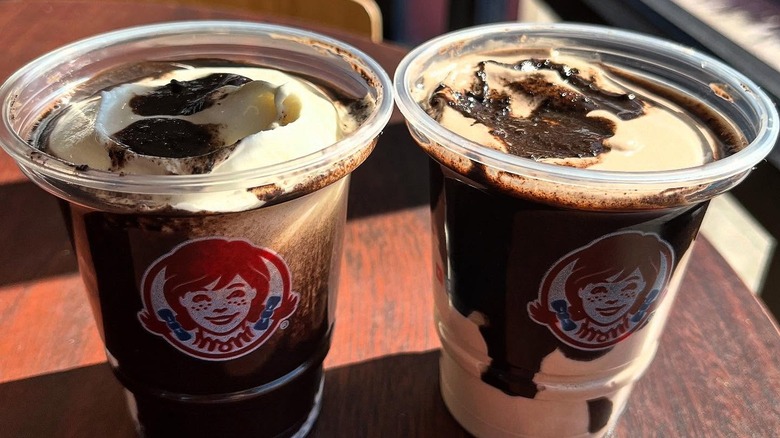One vanilla Thin Mint Frosty and one chocolate Thin Mint Frosty
