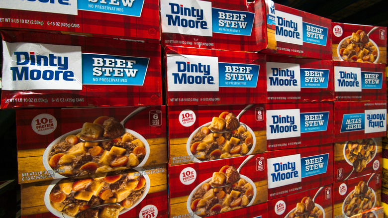 packages of dinty moore beef stew stacked on one another