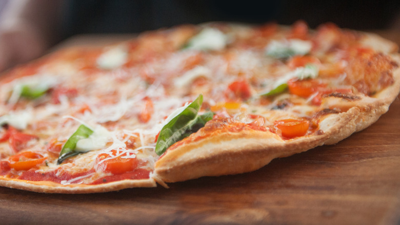 Close-up on thin pizza crust